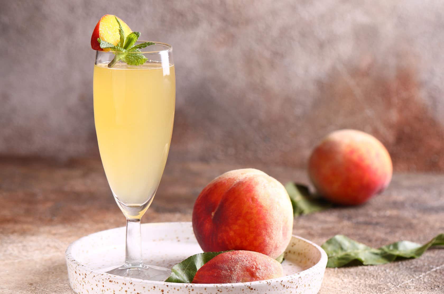 recette cocktail gin champagne pêche